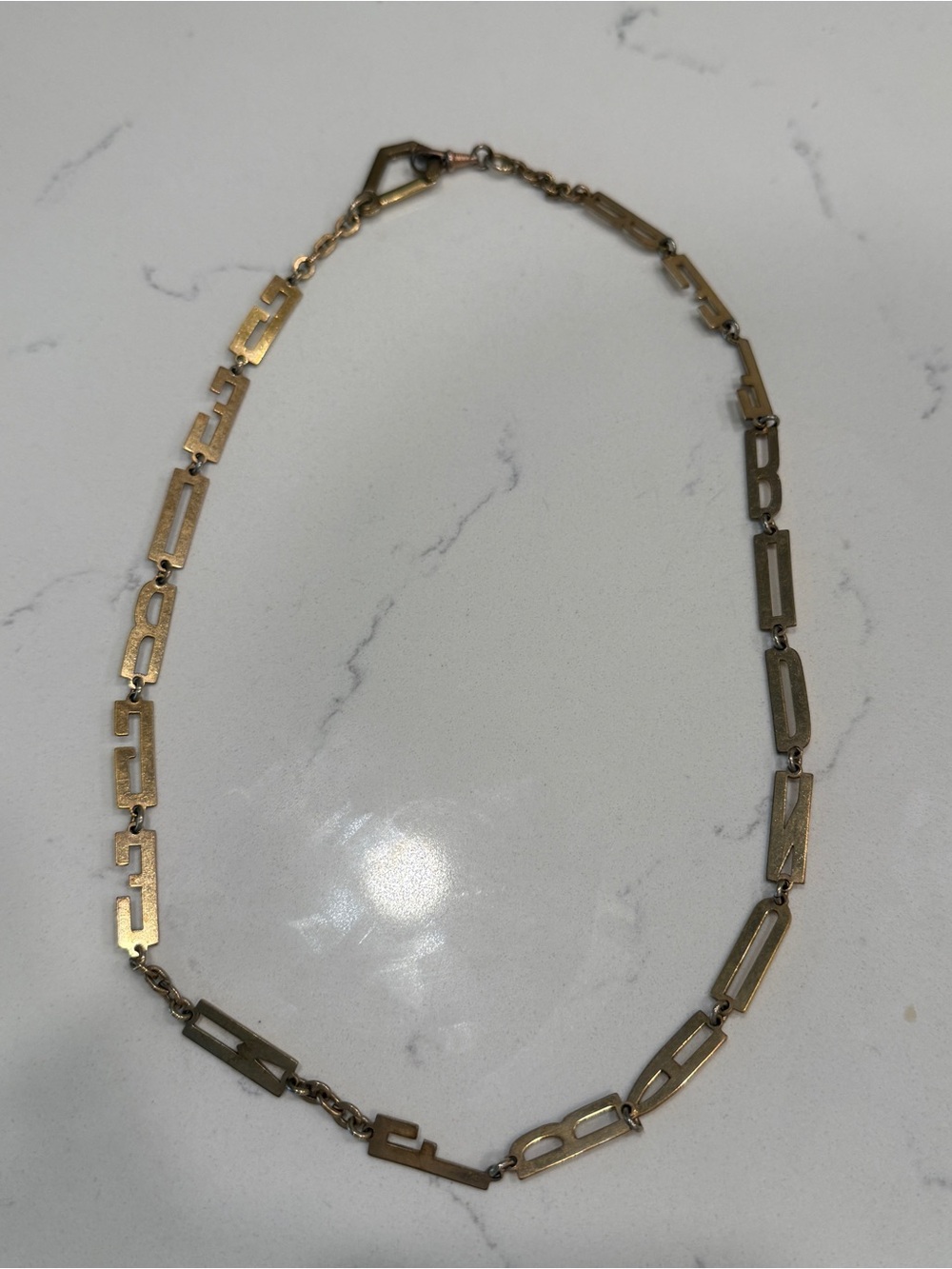 Gold Tone Letters Necklace